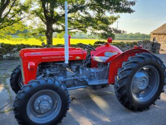 A red Massey Ferguson 35X Multi-Power tractor