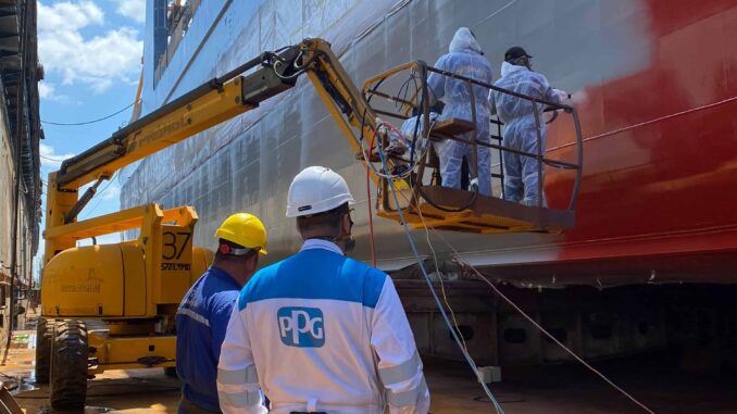 Trito Navigator being painted with PPG SigmaGlide 2390