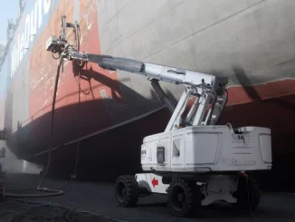 One of the five AMBPR Autonomous Mobile Blast & Paint Robots in action at Damen Shiprepair Dunkerque