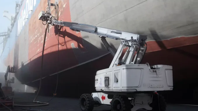 One of the five AMBPR Autonomous Mobile Blast & Paint Robots in action at Damen Shiprepair Dunkerque